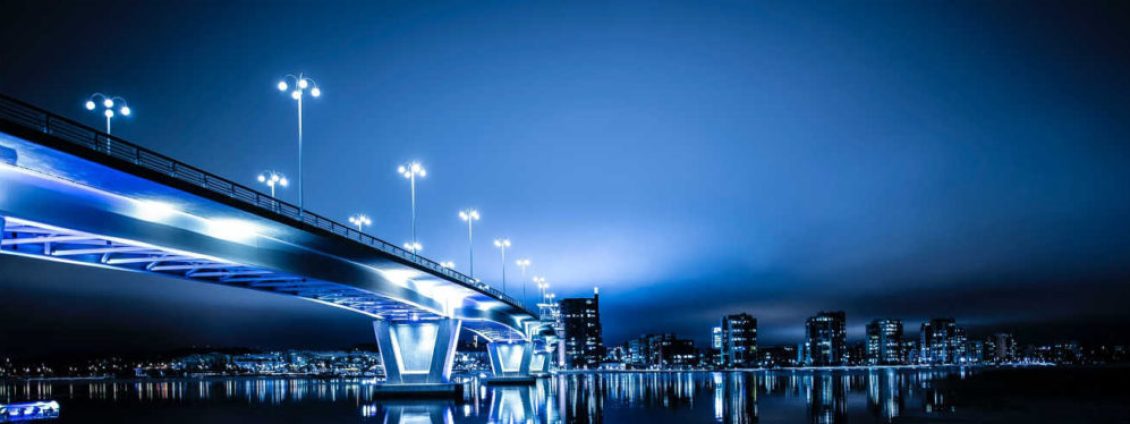 bridge-at-night-with-the-lights-on-across-river-1024×374 bridge-at-night-with-the-lights-on-across-river-1024x374